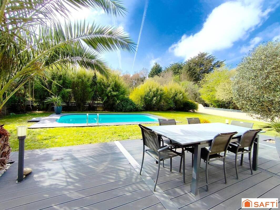 Photo 1 - Maison à CLOHARS-CARNOET