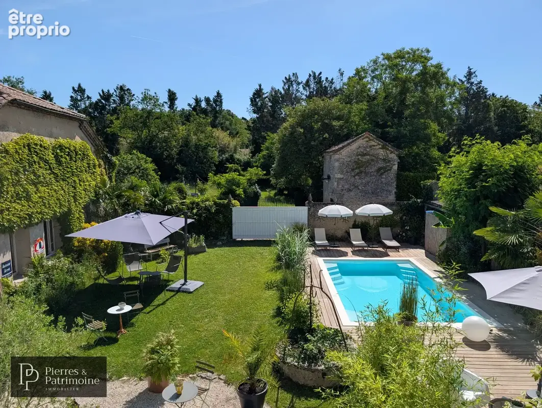 Belle propriété de ville en pierre avec jardin, piscine et potentiel proche CASTELJALOUX - photo 3