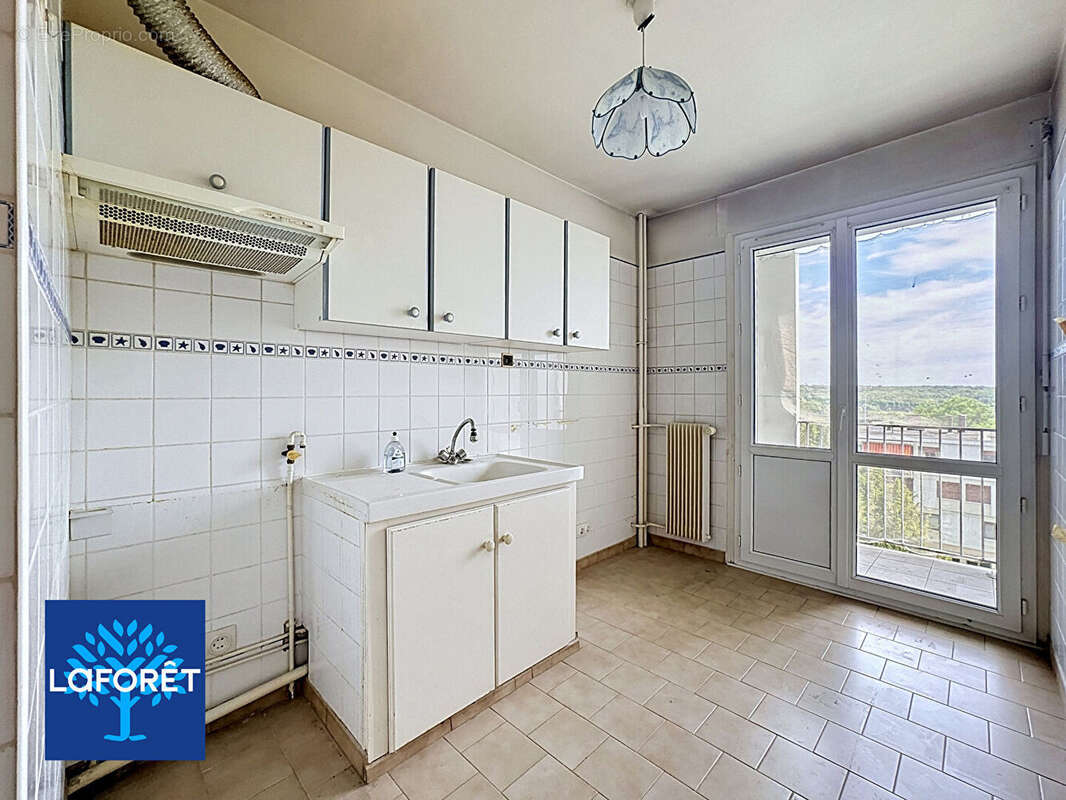Appartement Evry-Courcouronnes 3 pièces 60m² + 2 boxes + cave - photo 4