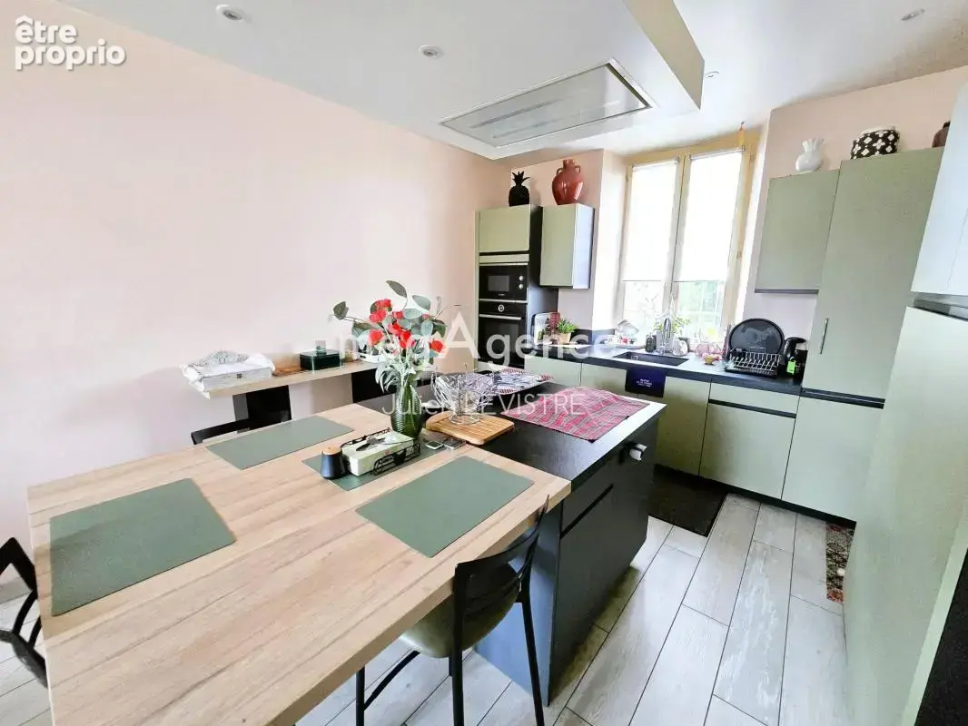 Maison de 7 pièces de 200m² - photo 3