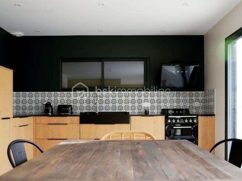 Maison à PONT-EVEQUE