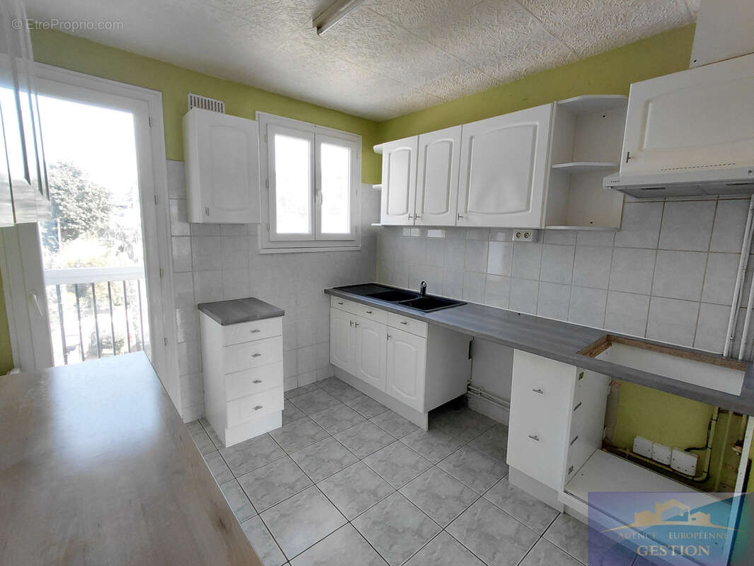 Appartement de type 4 de 71 m2 avec cave et garage - photo 4