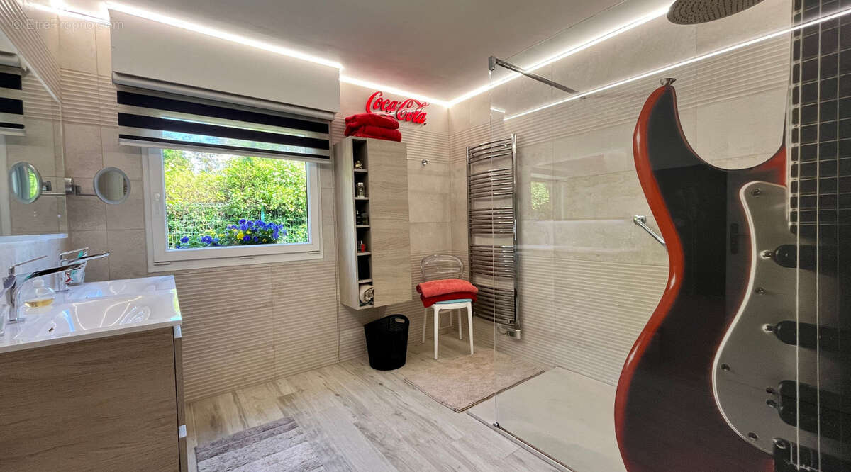 Plain-pied 4 chambres 120m² - photo 14