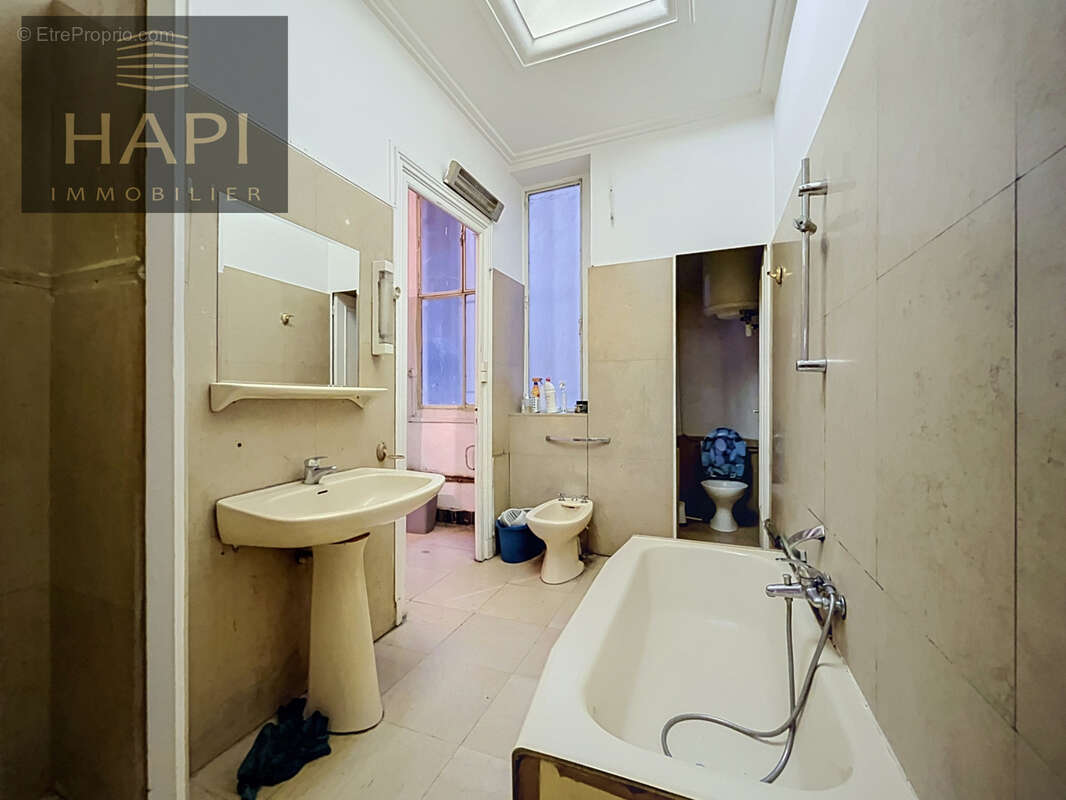 Appartement T2 58m2 plein centre ville - photo 8