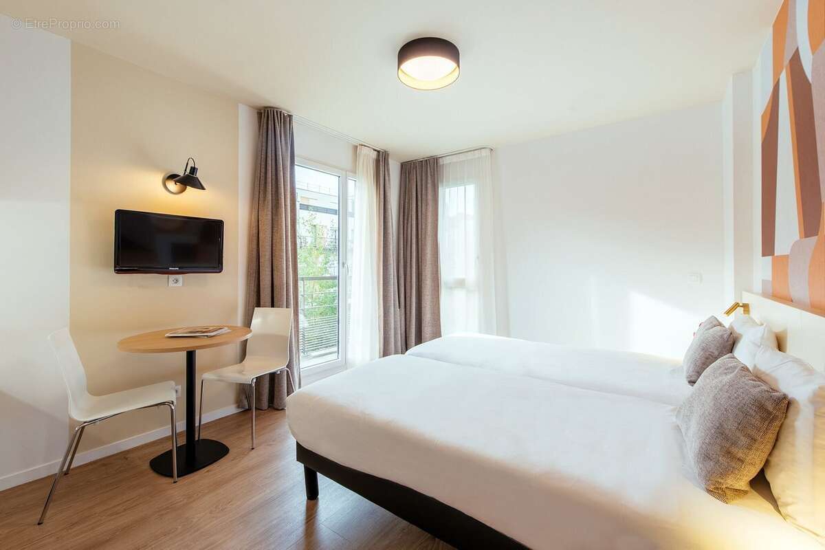 INVESTISSEMENT LOCATIF  Asnières-sur-Seine  Résidence d'Affaires Adagio Access Paris Asnières  6.12 % de rentabilité - photo 2