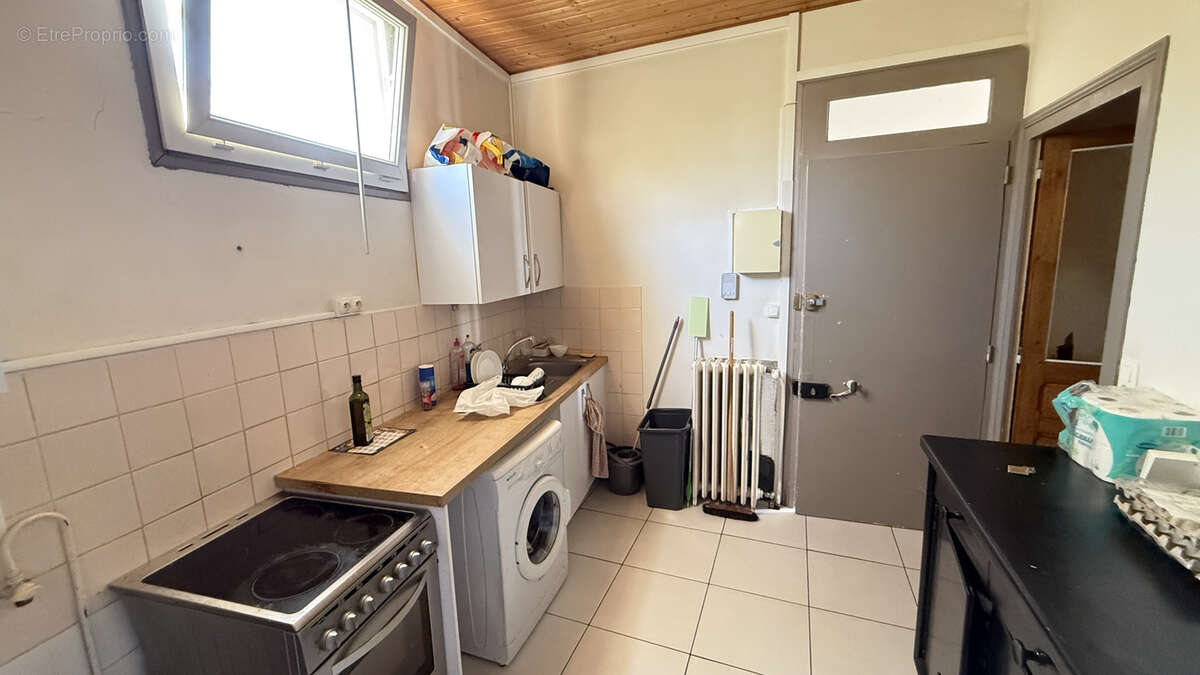 Investissement locatif à Vichy - Immeuble 3 appartements 4 garages - photo 19