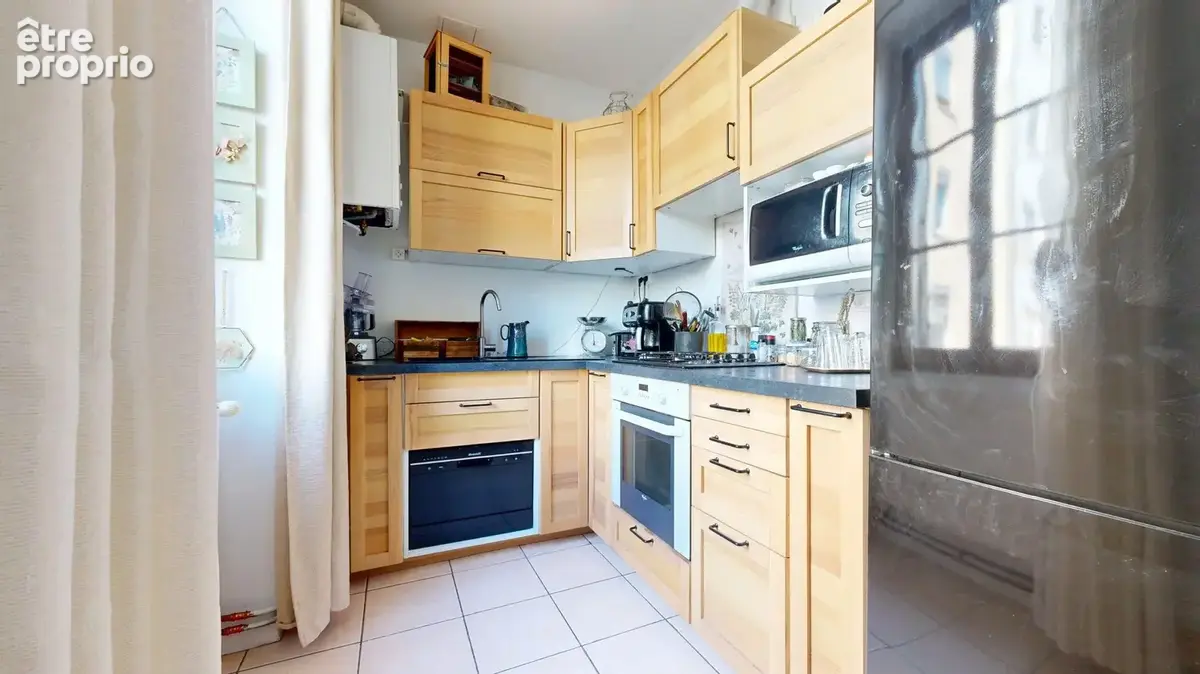 Appartement 3 pièces 59 m² à vendre à Lyon-7e (69007) - photo 4