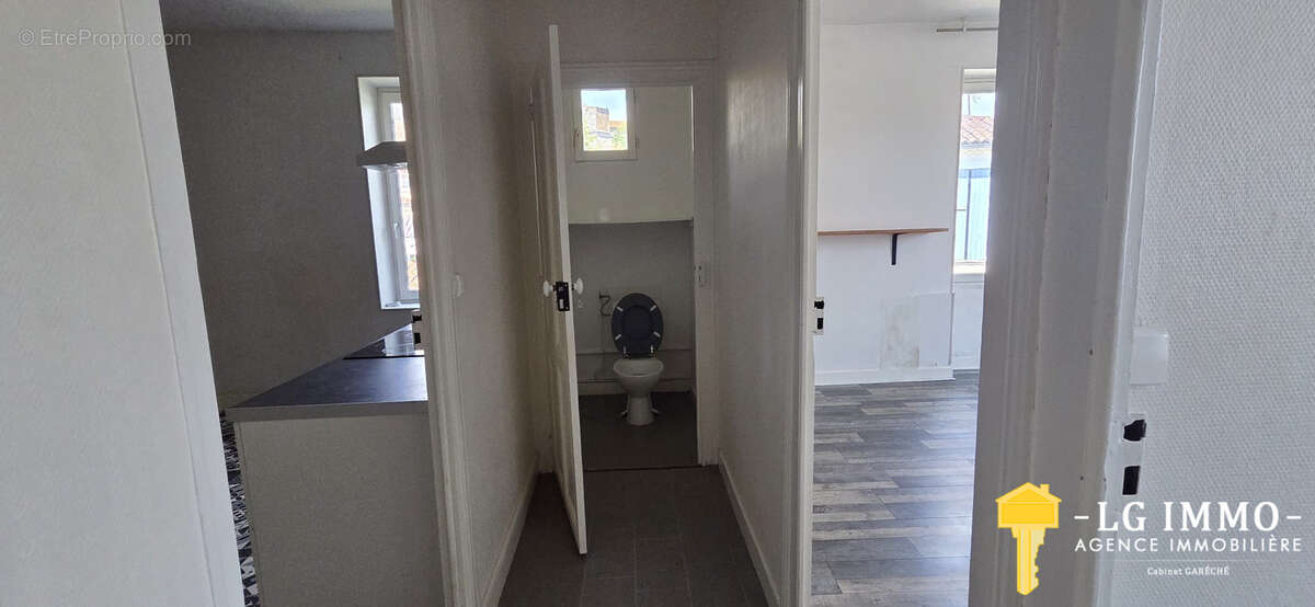 Appartement t3 + local commercial, centre bourg de mortagne - photo 9