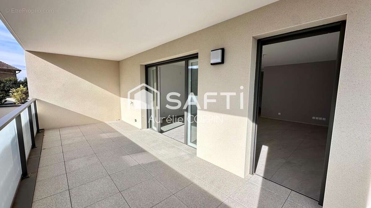 Photo 2 - Appartement à PONT-DE-CHERUY