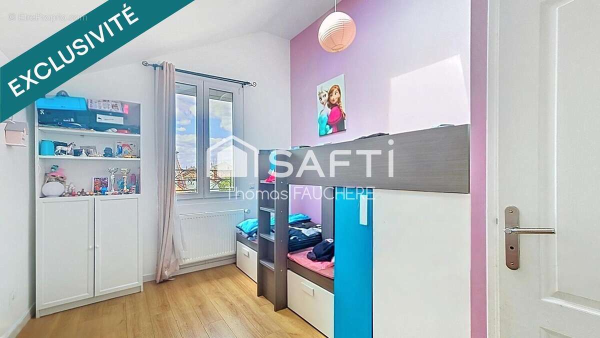 Photo 8 - Maison à VILLEMOMBLE