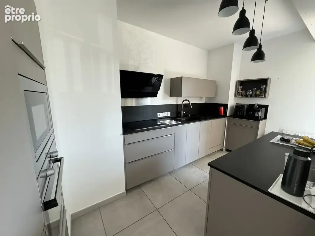 T4 avec terrasse et box proche toutes commodités - photo 7