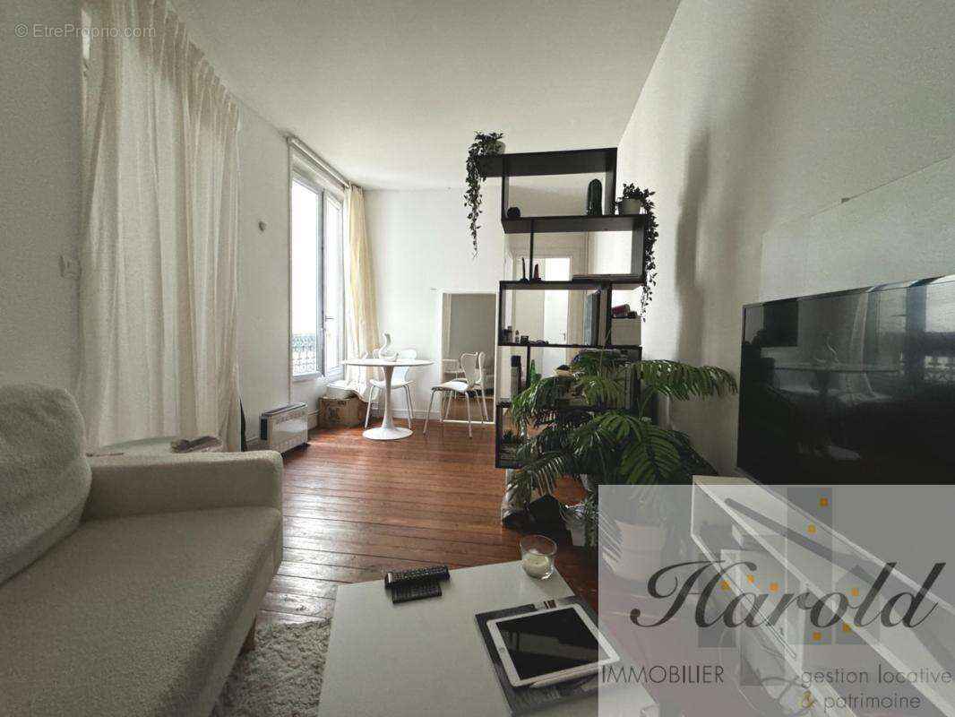 titre - Appartement à PARIS-15E