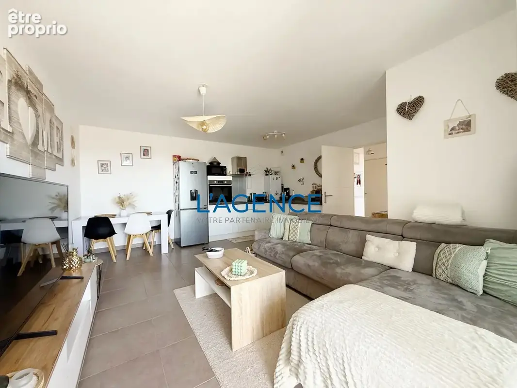 Appartement 3 pièces de 60m2  en étage avec ascenseur, terrasse, stationnement en sous-sol - photo 5