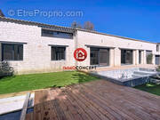 Maison à LAUDUN-L&#039;ARDOISE