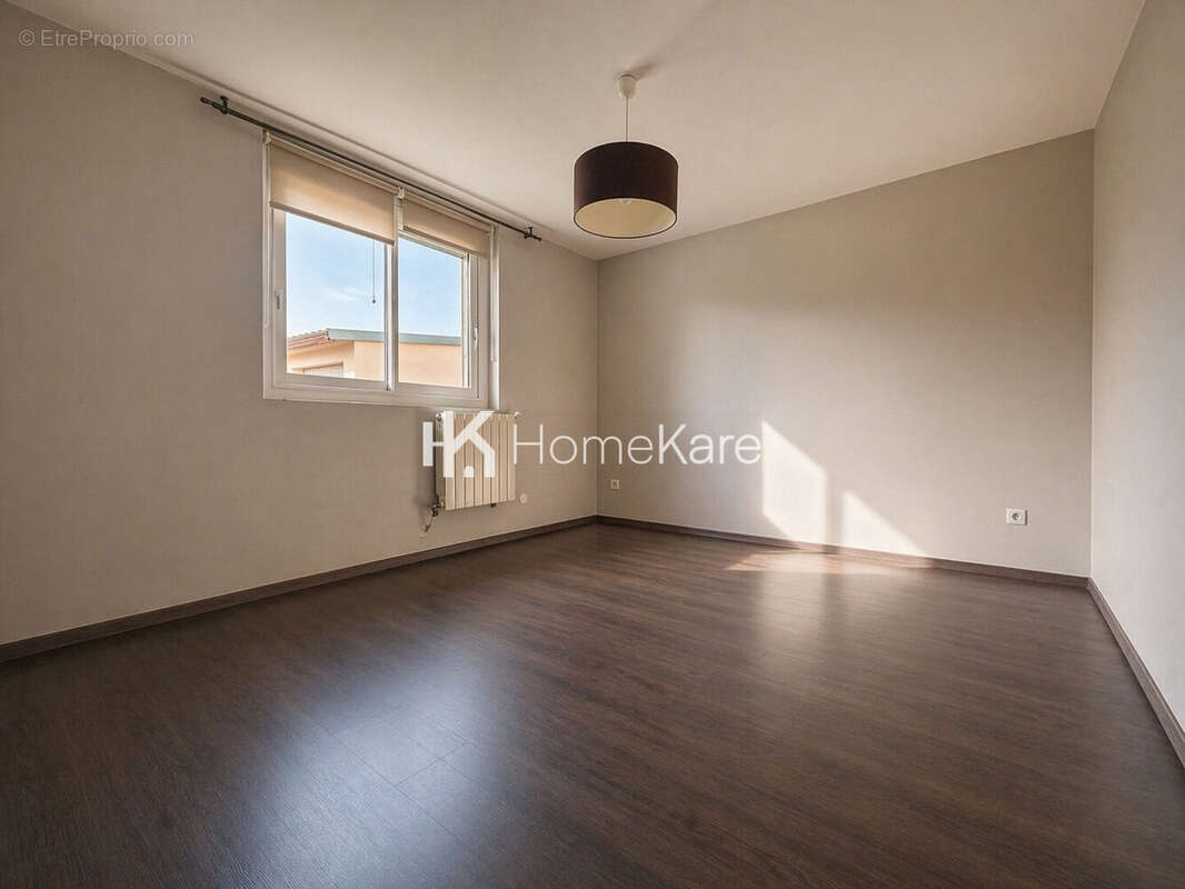 Appartement à BEAUZELLE