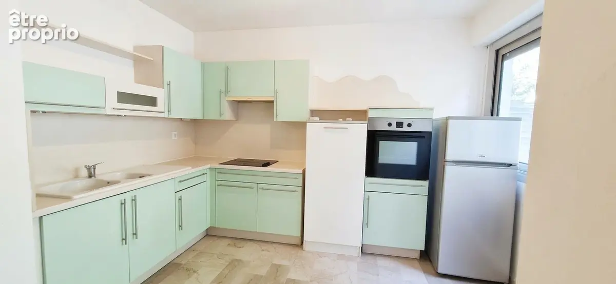Appartement T2 avec grande terrasse, cave et parking privé - photo 3