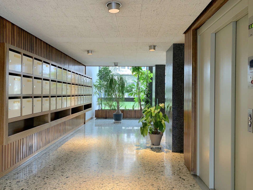 Appartement T4 de 88 m2, 3 chambres, loggia et parking - photo 2
