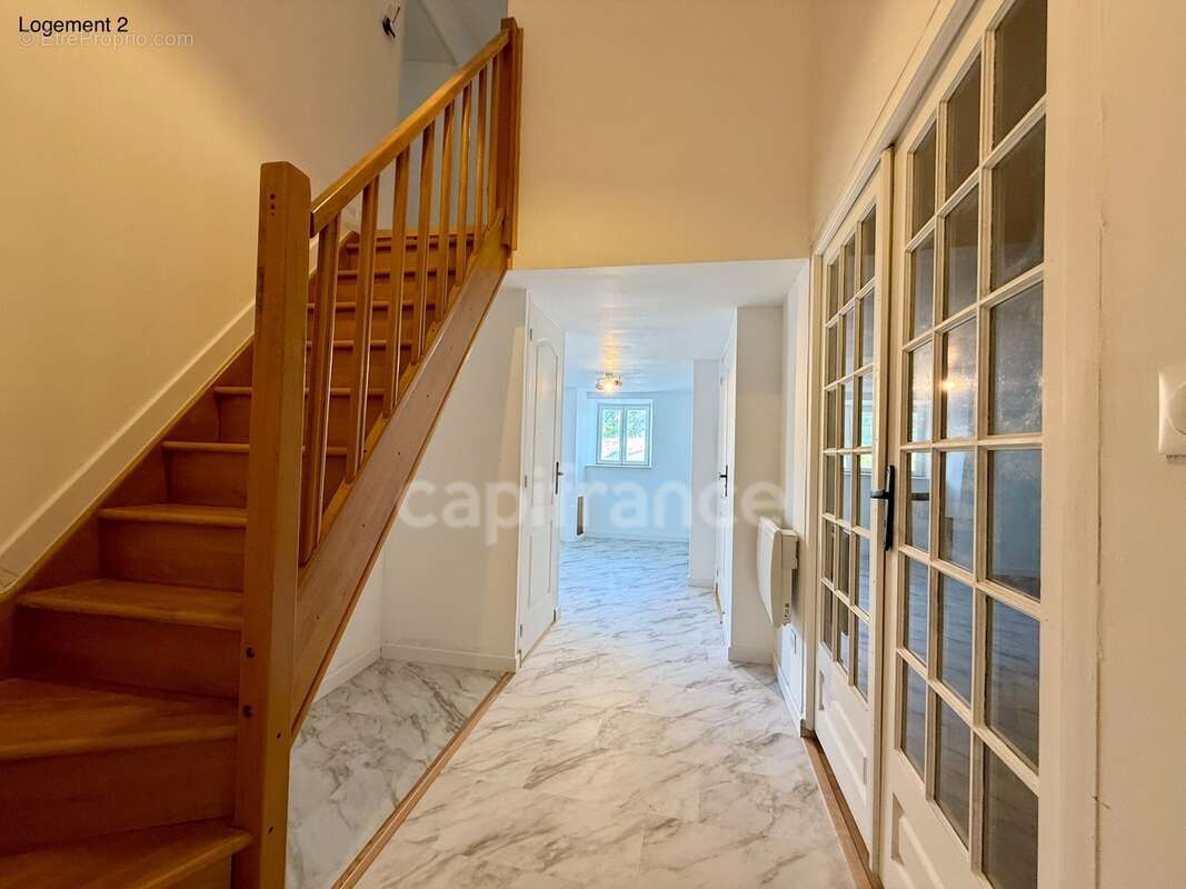 Maison avec deux logements indépendants : une opportunité rare pour habiter, investir ou réunir plusieurs générations - photo 18