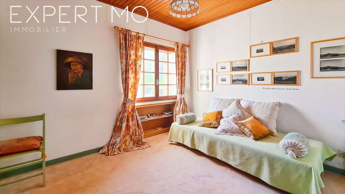 Propriété comprenant deux maisons dont une avec piscine intérieure chauffée - photo 11
