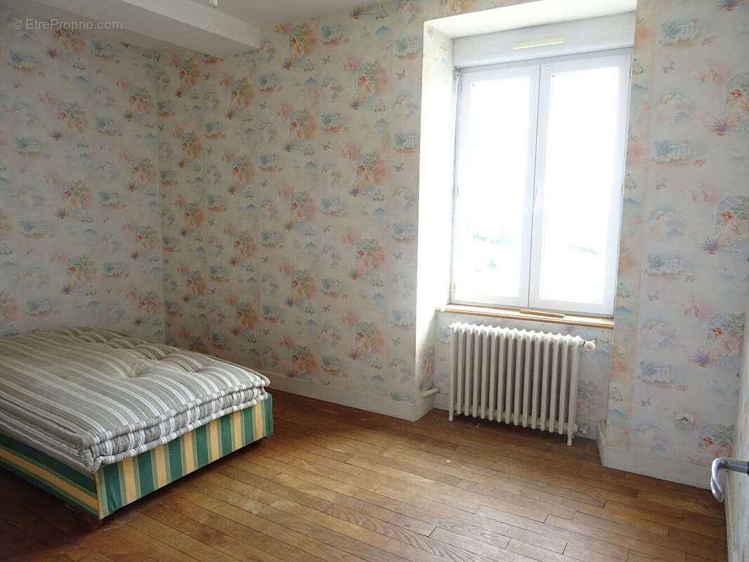 Maison à JUVIGNY-LE-TERTRE