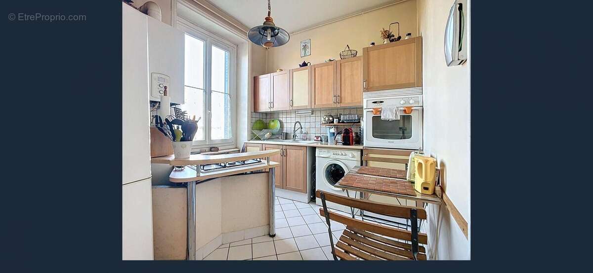 Cuisine - Appartement à VILLEFRANCHE-SUR-SAONE