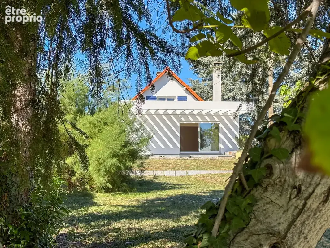 Maison familliale de 168m2 sur 1550m2 de terrain arboré - photo 2