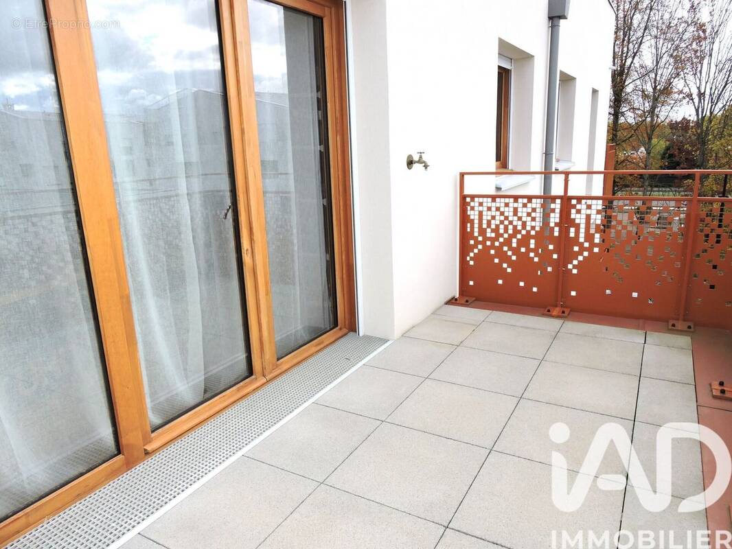 Photo 1 - Appartement à VOISINS-LE-BRETONNEUX