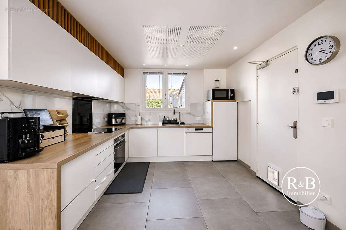 Maison Les Clayes Sous Bois 4 pièce(s) 74 m2 - photo 6