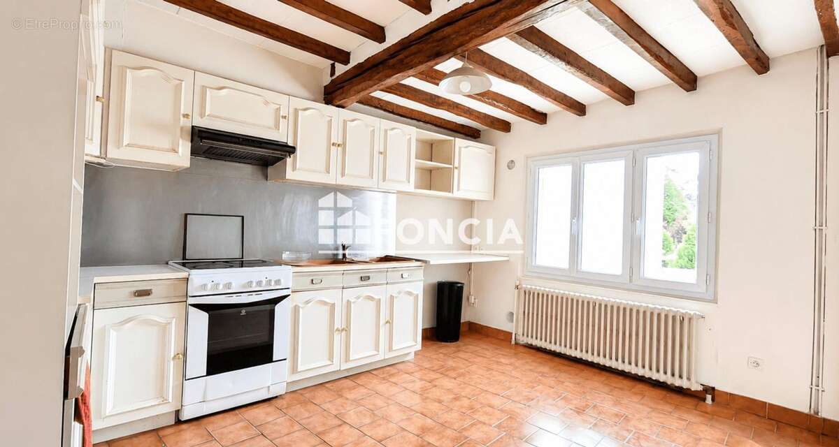 Maison T4 avec terrasse, garage et beau potentiel – Proche du centre-ville de Château-Thierry - photo 2