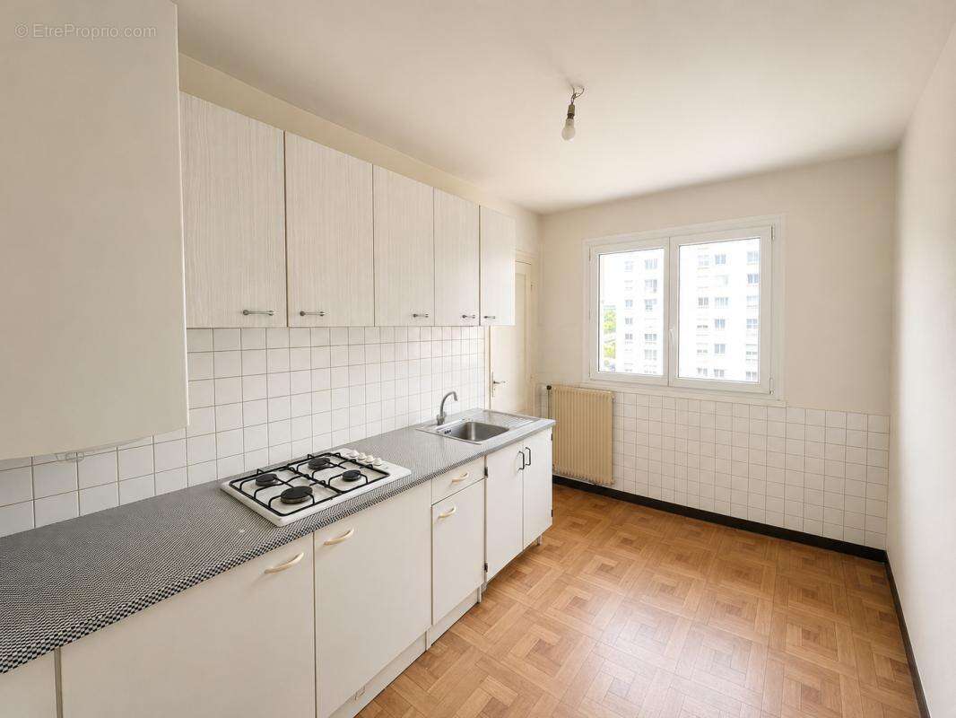 Appartement T3 63,40m2 - 2 chambres - parking et cave - photo 6