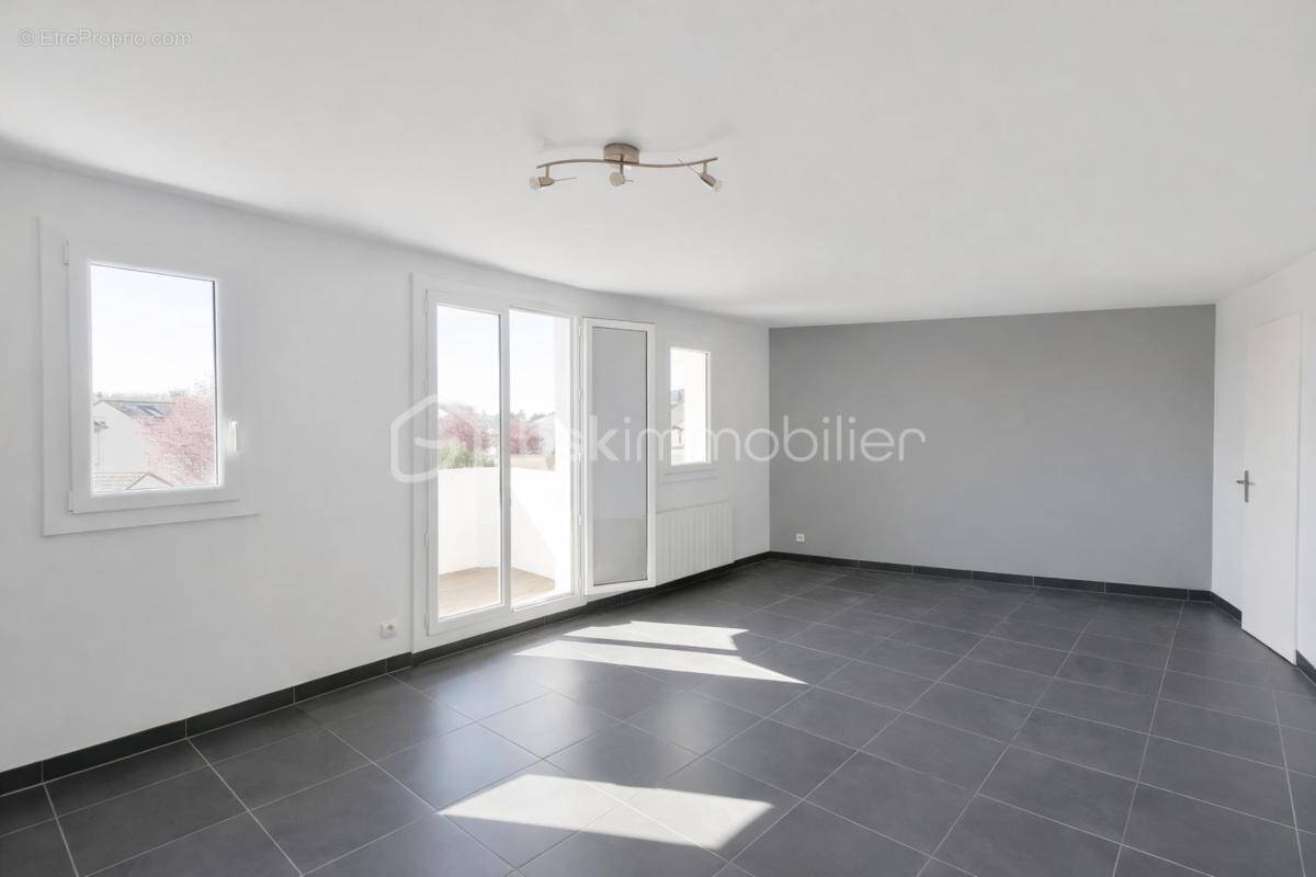 Appartement à VOISINS-LE-BRETONNEUX