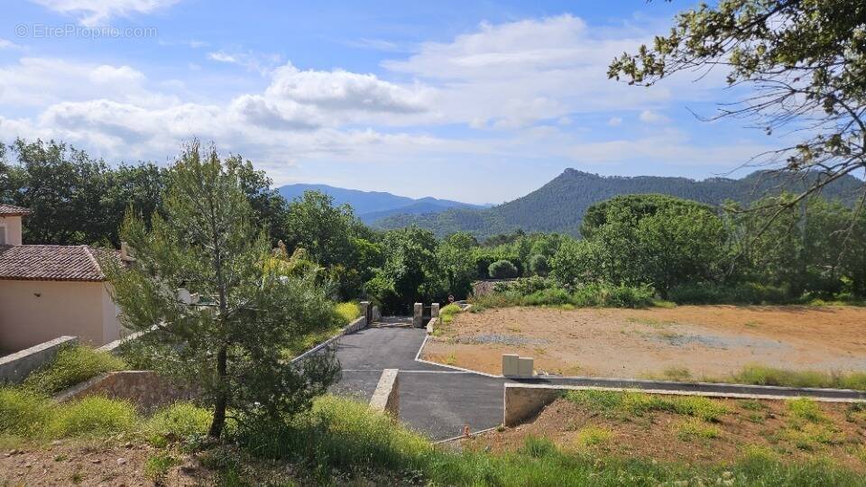 Terrain à BAGNOLS-EN-FORET