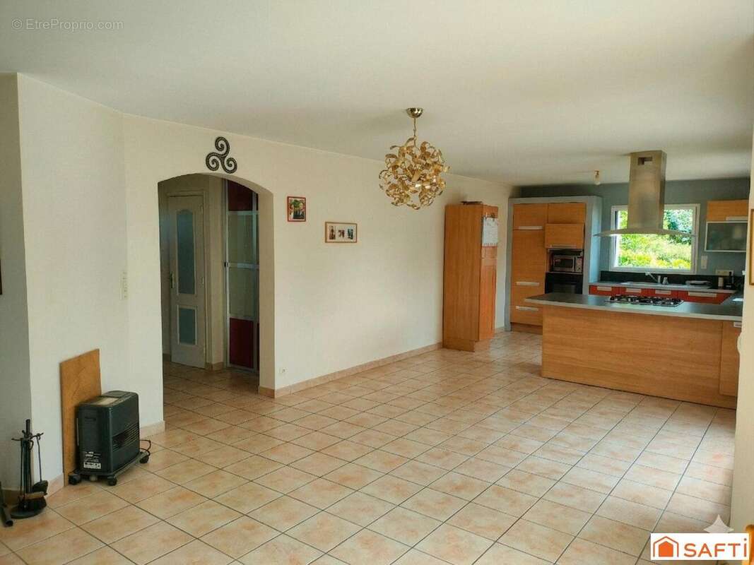 Photo 2 - Maison à PLUGUFFAN