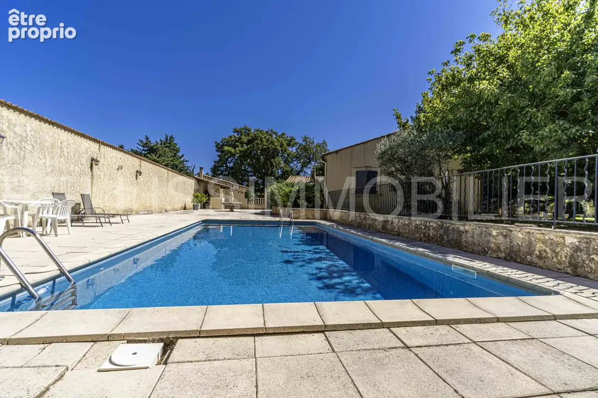 Maison de plain-pied avec terrain et piscine - photo 10