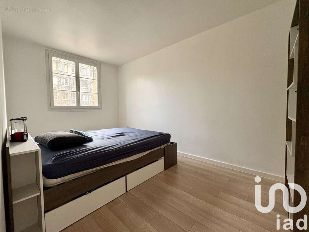 Photo 9 - Appartement à COURBEVOIE