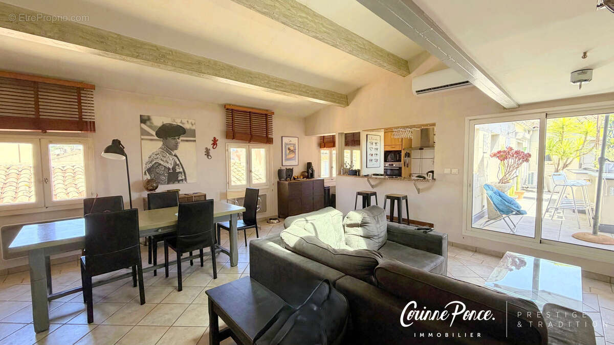 Nimes centre historique dernier etage p3/p4 92 m2 terrasse40m2 propose par corinne ponce immobilier - photo 2