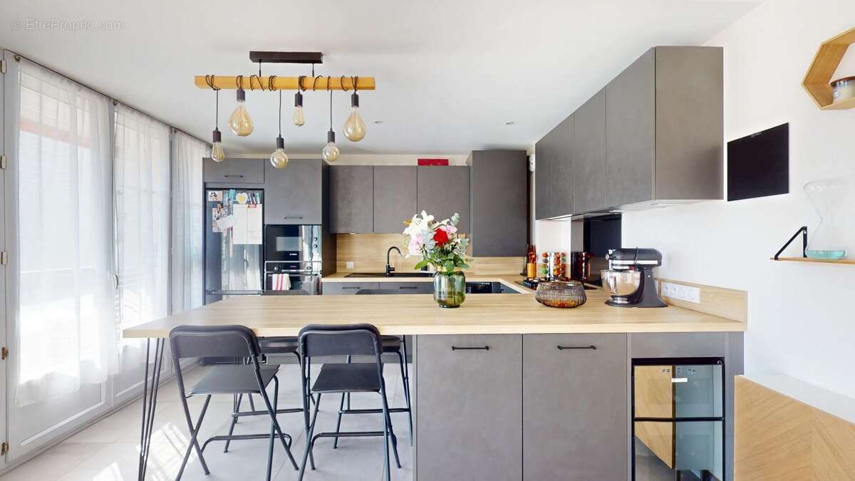 Appartement T4 rénové avec balcon – Résidence calme et sécurisée - photo 6