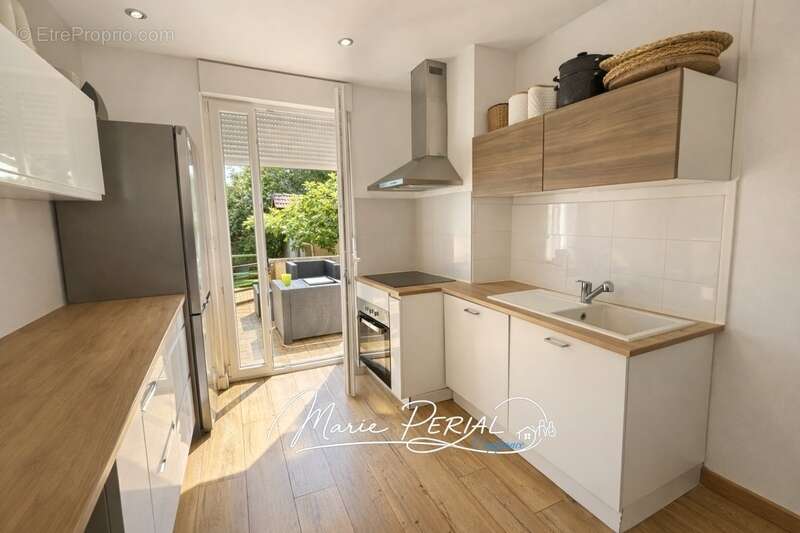Appartement 3 pièces de 75 m² en rez-de-chaussée avec jardin privatif de 175 m², terrasse, cave et dépendance - Toul (54200) - photo 4