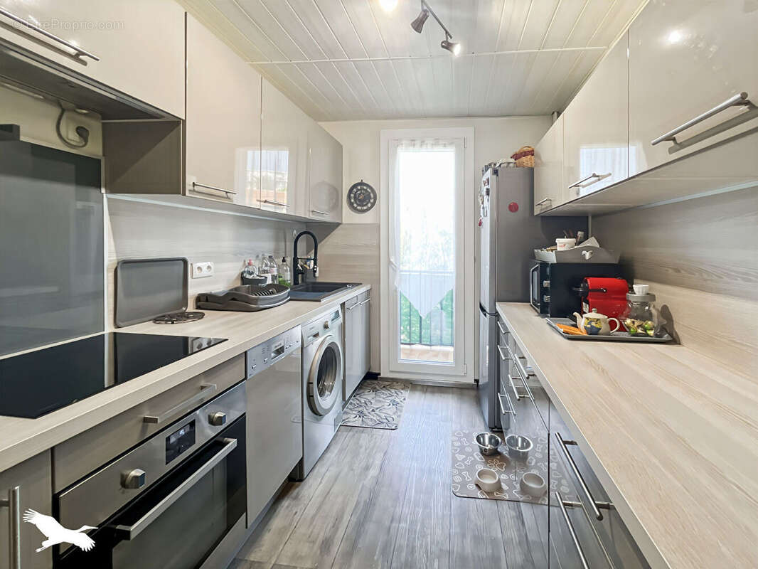 EXCLUSIVITÉ -T3 traversant Sud Nord de 59 m² avec 2 balcons (2ème étage) ? Bd Mireille Lauze - photo 2