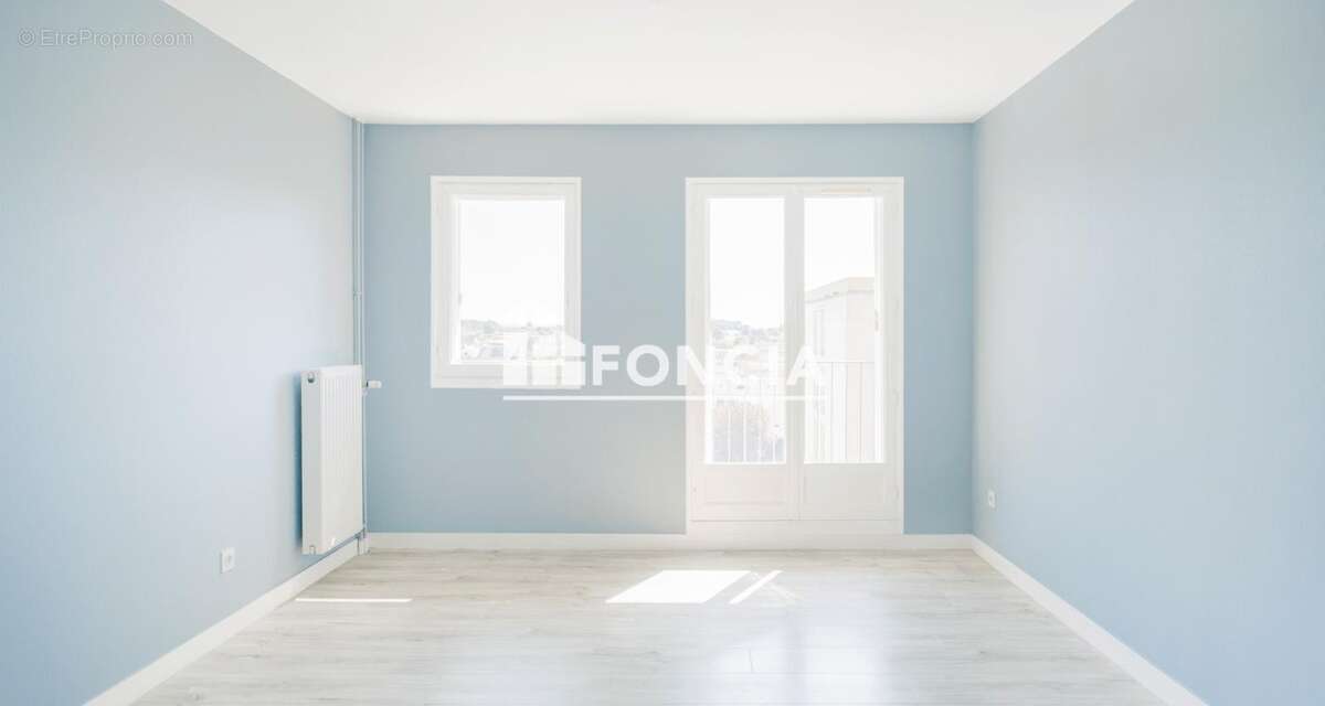 Appartement de 67,3 m2 avec balcon, très bon état, proche commerces et transports - photo 3