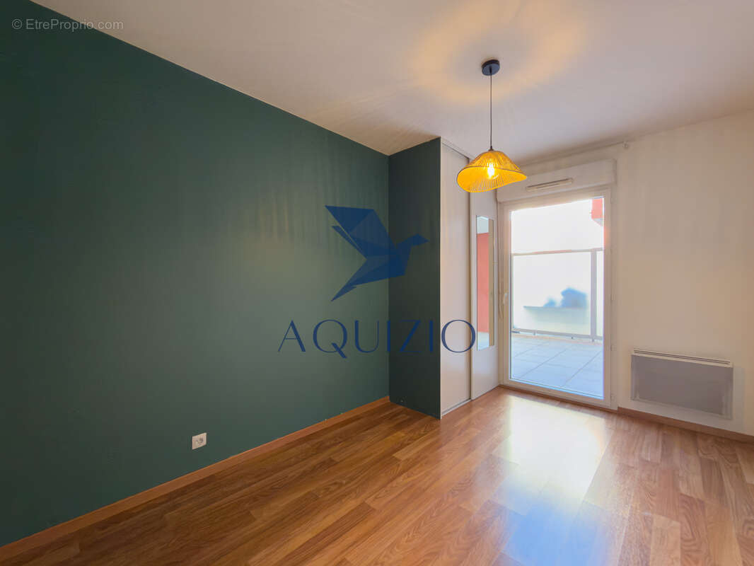 Appartement T3 en rez de jardin avec grande terrasse - photo 10