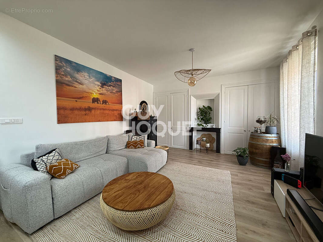 Appartement T2 Bis possibilité T3 au centre  d'Echalas de 73.27 m2 - photo 2