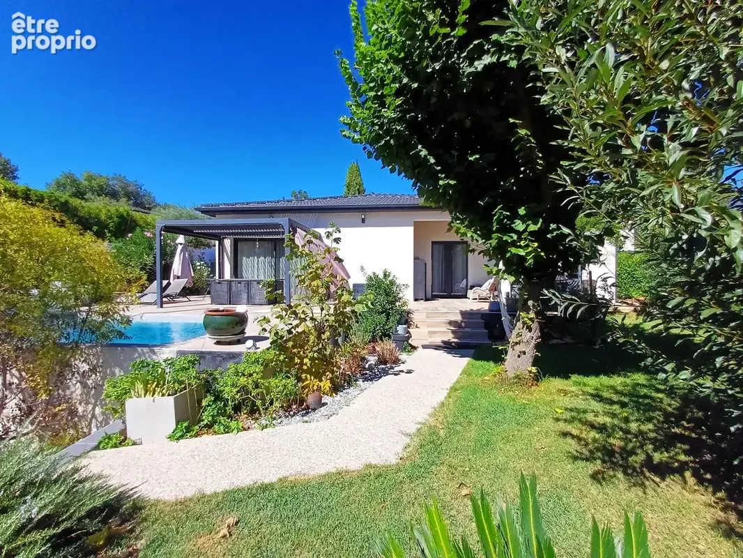 Maison moderne plain-pied 134 m2, 4 chambres, piscine, garage, DPE A sur parcelle de 805 m2 - photo 1