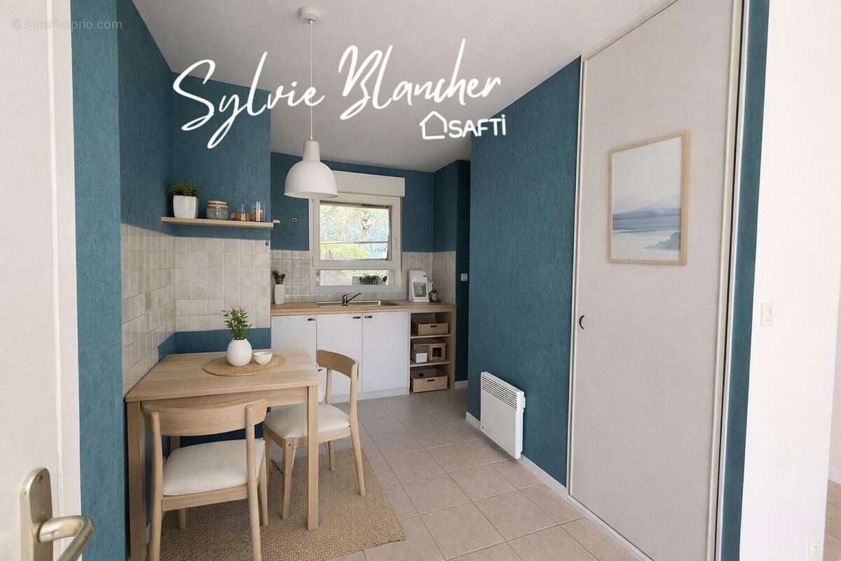 Photo 2 - Appartement à HEROUVILLE-SAINT-CLAIR