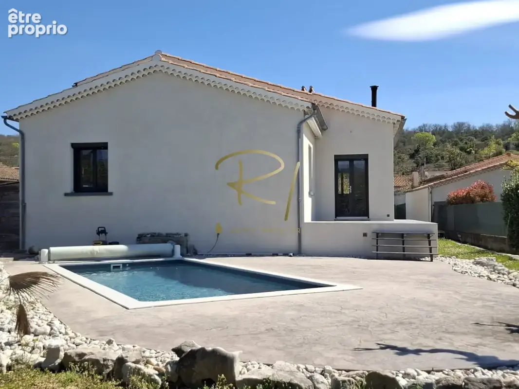 Maison 4 chambres, piscine et terrain - RUOMS CENTRE - photo 13