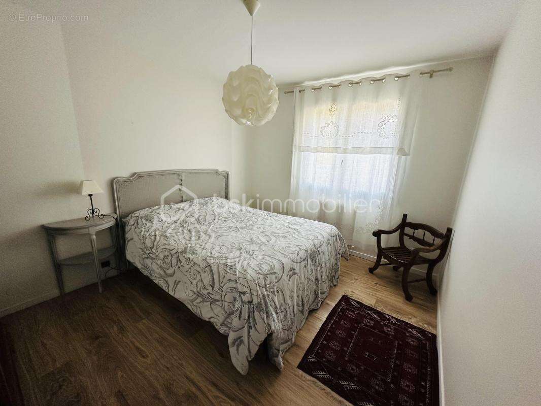 Appartement en rez de jardin avec garage + place de parking privative - photo 7