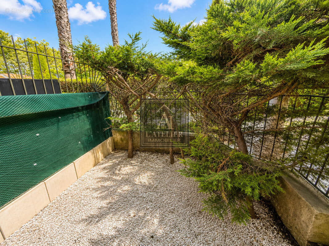 Appartement en rez-de-jardin avec extérieurs à proximité des commodités - photo 8