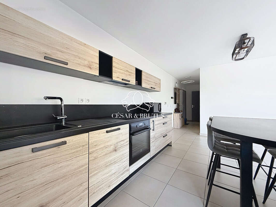 Appartement 63 m² à Bron  - photo 4