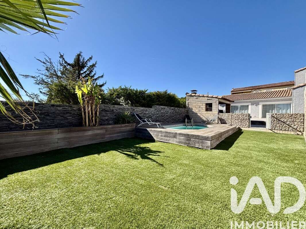 Maison 119 m² à Causses-Et-Veyran  - photo 3