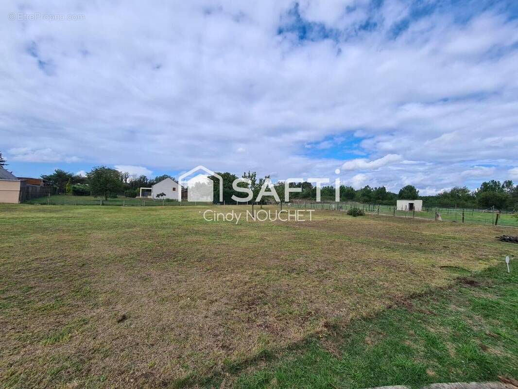 Photo 1 - Terrain à LES RAIRIES